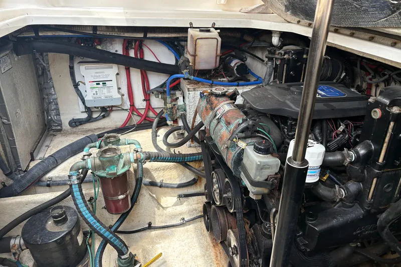 Slide: The Image of Engine compartment of a 2008 Searay 290 AMBERJACK with visible wiring and components. - 8