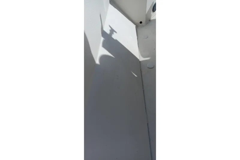 Slide: The Image of Shadow on the deck of a 2024 Ranger RB200 boat. - 13