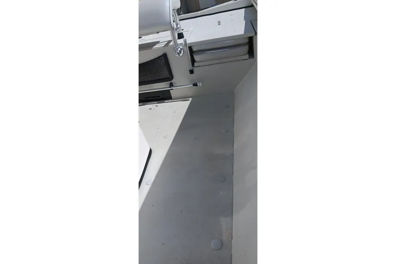 Slide: The Image of 2024 Ranger RB200 boat interior with seating and storage compartments. - 20