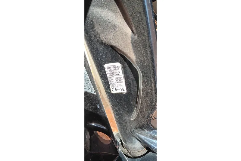 Slide: The Image of Close-up of a 2024 Ranger RB200 label inside a vehicle door frame. - 25