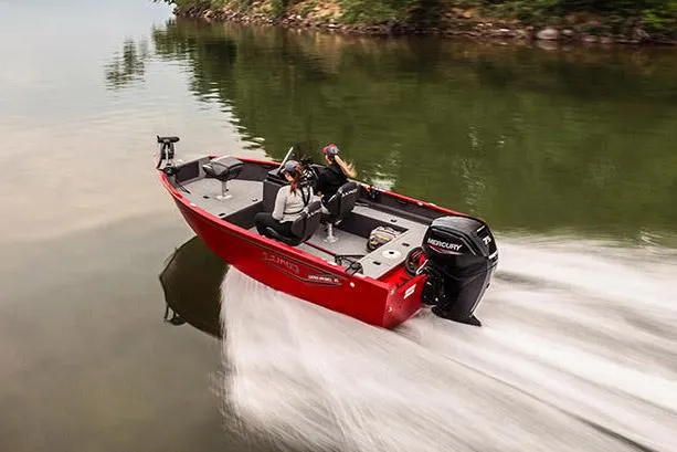 Slide: The Image of Manufacturer Provided Image: 2025 Lund 1650 Rebel XL SS boat cruising on a calm lake. - 3