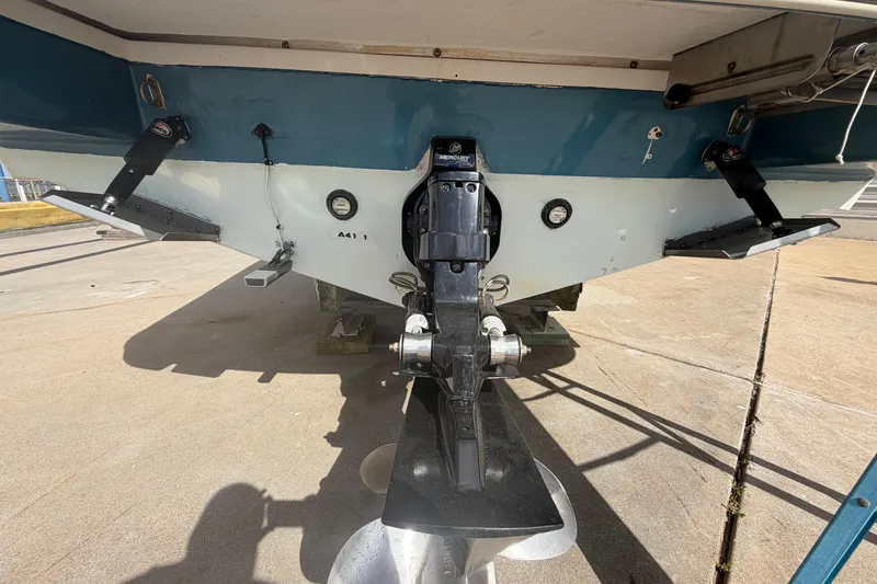 Slide: The Image of Rear view of a 2001 Chris-Craft Launch 28 boat on a trailer. - 8