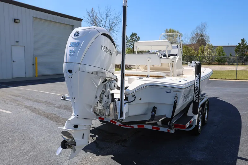 Slide: The Image of 2024 Pathfinder 2300 HPS boat with Yamaha 300 V6 engine on trailer. - 2