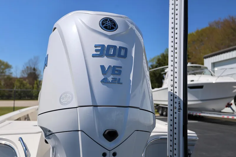 Slide: The Image of 2024 Pathfinder 2300 HPS boat with Yamaha 300 V6 4.2L engine. - 3