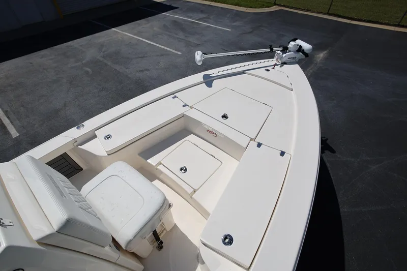 Slide: The Image of 2024 Pathfinder 2300 HPS boat deck with seating and storage compartments. - 8