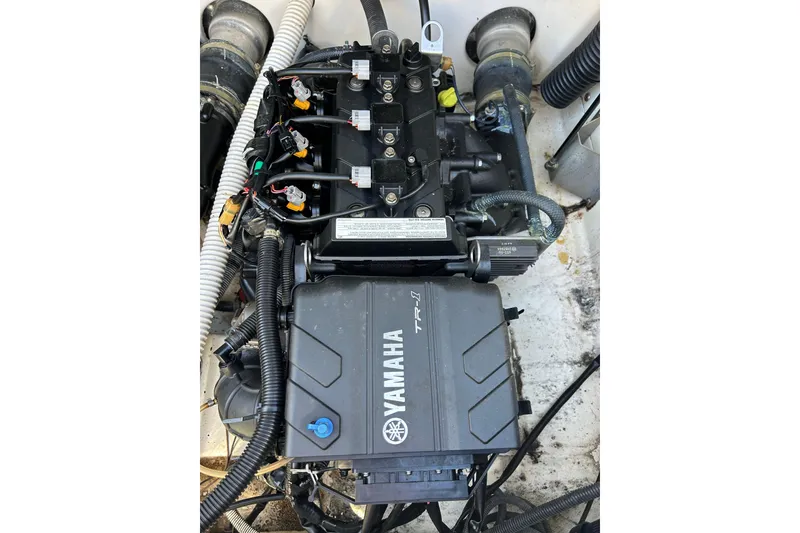 Slide: The Image of Engine compartment of a 2017 Yamaha Boats AR210, showcasing the TR-1 engine. - 8
