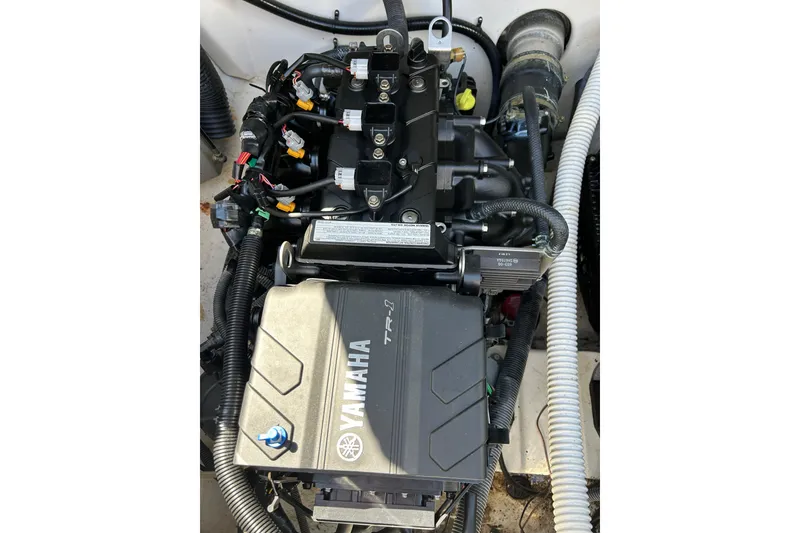 Slide: The Image of 2017 Yamaha AR210 engine compartment showcasing TR-1 engine components and wiring. - 9
