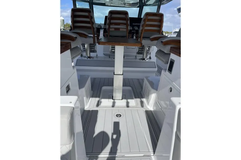 Slide: The Image of 2025 HCB 56 Suenos boat interior with sleek seating and modern design. - 13