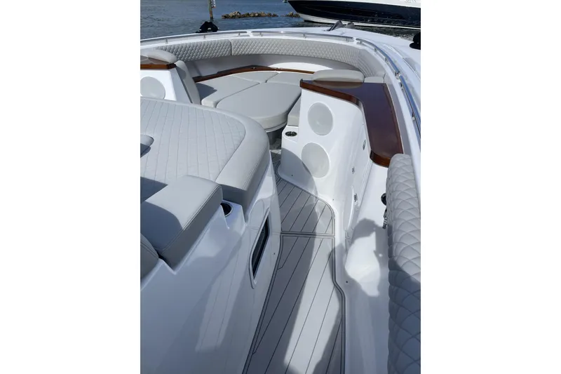Slide: The Image of Luxurious interior of 2025 HCB 56 Suenos boat with quilted seating and sleek design. - 18