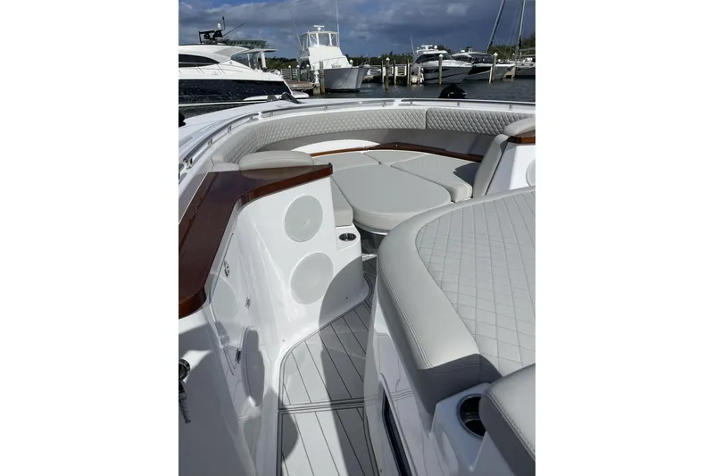 Slide: The Image of 2025 HCB 56 Suenos luxury boat interior with plush seating and sleek design. - 19