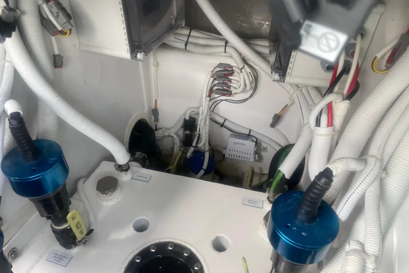 Slide: The Image of Engine room of 2025 HCB 56 Suenos boat with wiring and components. - 17