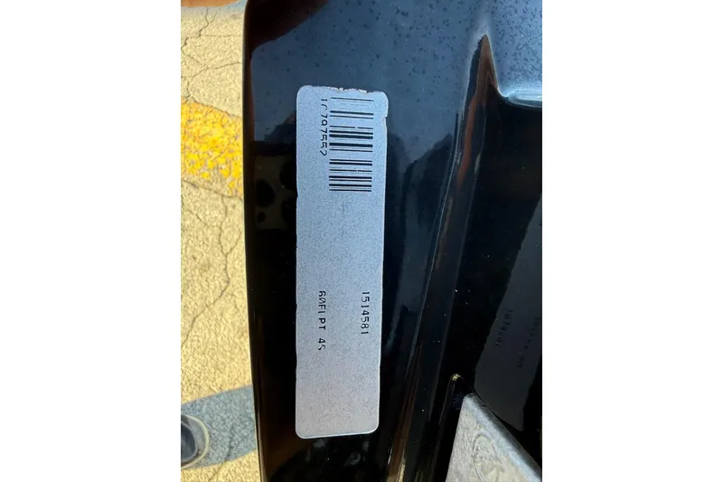 Slide: The Image of Barcode and serial number on 2025 Mako Pro Skiff 15 CC boat. - 15