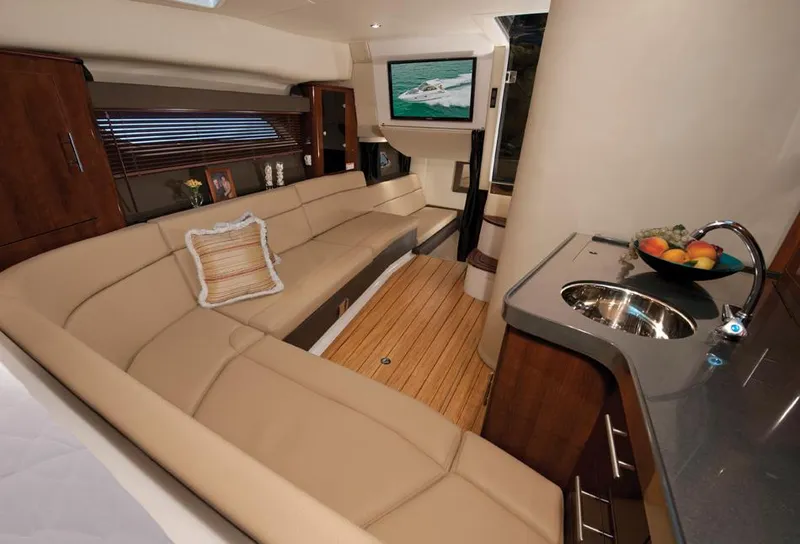 Slide: The Image of Manufacturer Provided Image: Luxurious interior of 2015 Regal 35 Sport Coupe with leather seating and kitchenette. - 3