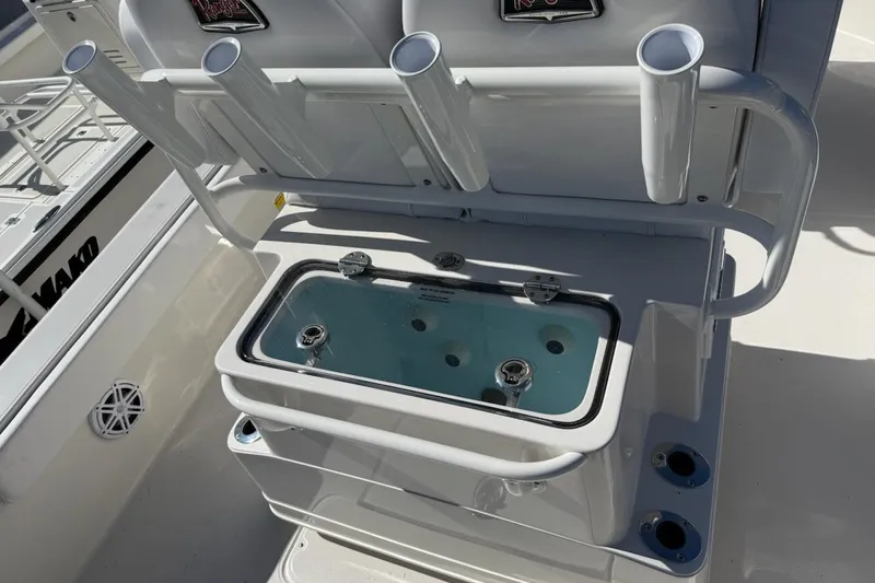 Slide: The Image of Ranger 2360 Bay 2025 boat with rod holders and livewell on deck. - 7