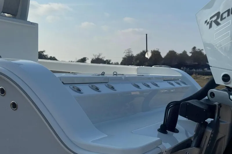 Slide: The Image of 2023 Freeman 28 boat with sleek design and modern features, outdoors. - 20