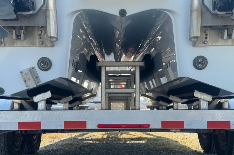 Slide: The Image of Underneath view of a 2023 Freeman 28 boat on a trailer. - 21