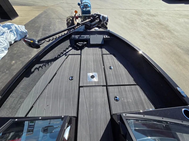 Slide: The Image of Vexus Boats ADX190 2026 featuring sleek deck design and fishing accessories. - 11