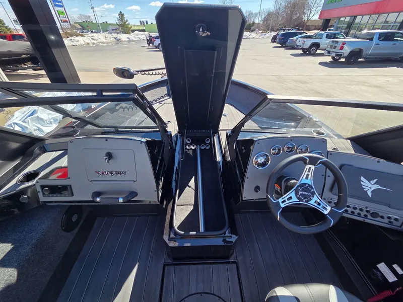 Slide: The Image of Interior view of 2026 Vexus Boats ADX190 cockpit with controls. - 16