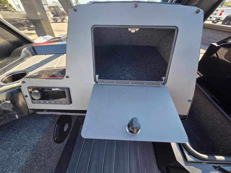 Slide: The Image of Interior view of 2026 Vexus Boats ADX190 with storage compartment. - 18