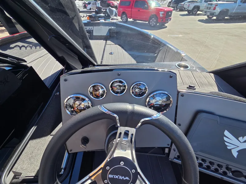 Slide: The Image of Dashboard of Vexus Boats ADX190, 2026 model, featuring gauges. - 20