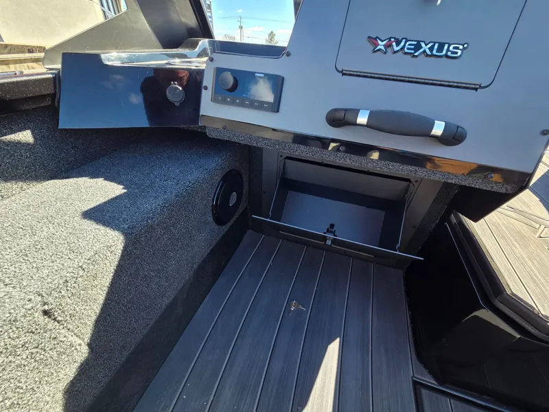 Slide: The Image of Interior view of 2026 Vexus Boats ADX190 with storage compartment. - 23