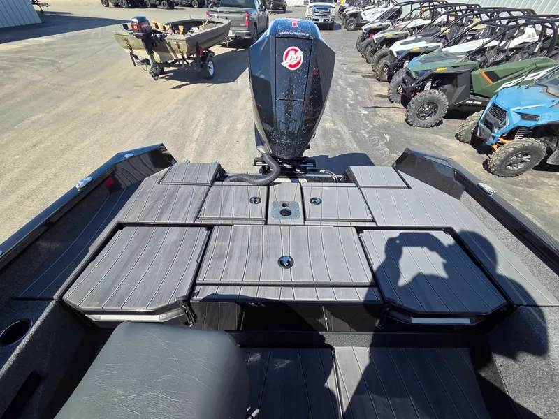 Slide: The Image of 2026 Vexus Boats ADX190 with outboard motor on parking lot. - 29