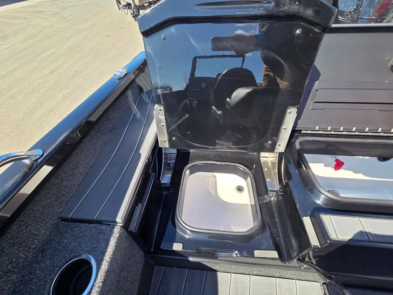 Slide: The Image of Interior view of 2026 Vexus Boats ADX190 with storage compartment. - 32