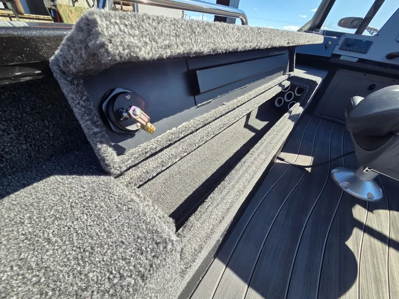 Slide: The Image of Interior of 2026 Vexus Boats ADX190 with carpeted flooring and seating. - 37