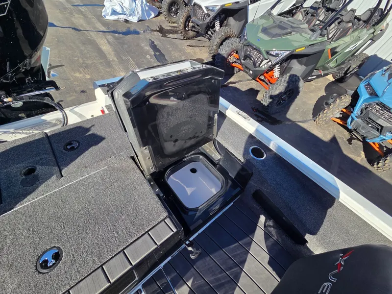 Slide: The Image of 2026 Vexus Boats AVX1985s with open storage compartment on deck. - 31
