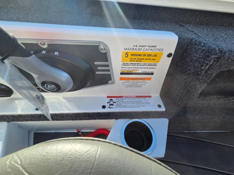 Slide: The Image of Vexus Boats AVX1985s 2026 console with capacity warning label. - 36