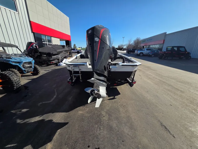 Slide: The Image of Rear view of a 2026 Vexus Boats AVX1985s with outboard motor. - 4