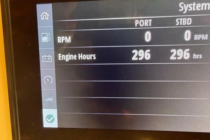 Slide: The Image of Display screen showing 2024 Scout 277 LXF engine hours at 296. - 23