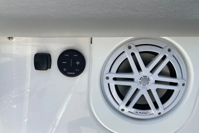 Slide: The Image of 2026 Monterey Elite 30 OB boat audio controls and JL Audio speaker. - 10