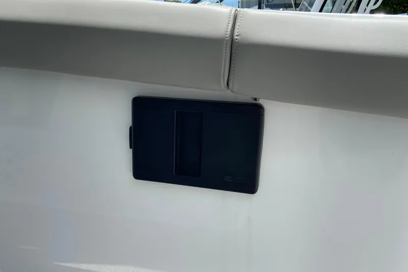 Slide: The Image of 2026 Monterey Elite 30 OB boat detail with sleek white and black panel design. - 19
