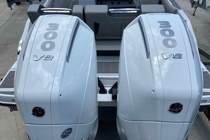 Slide: The Image of Twin Mercury 300 V8 engines on a 2026 Monterey Elite 30 OB boat. - 2
