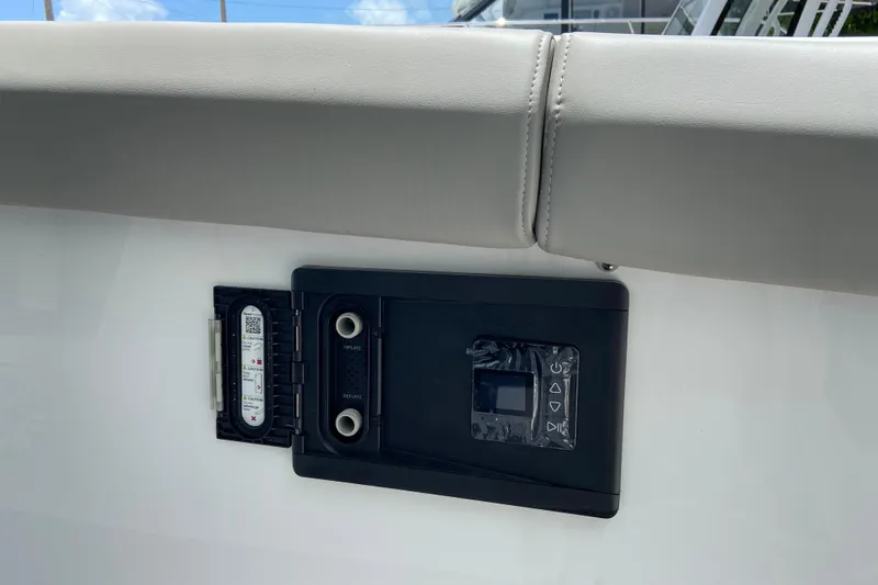 Slide: The Image of Control panel on 2026 Monterey Elite 30 OB boat, featuring inflate and deflate options. - 20