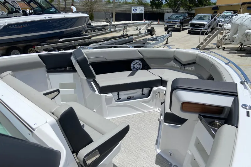 Slide: The Image of 2026 Monterey Elite 30 OB boat interior with luxurious seating and modern amenities. - 32
