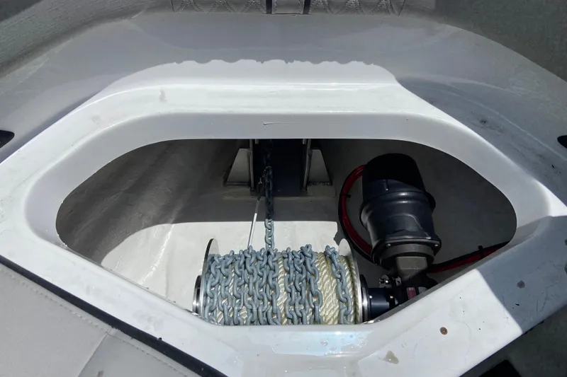 Slide: The Image of Anchor locker of 2026 Monterey Elite 30 OB with chain and winch. - 34