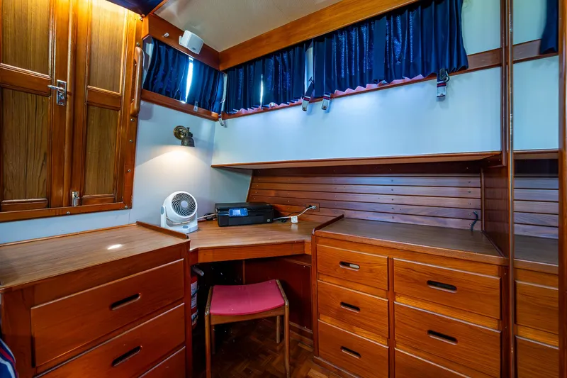 Slide: The Image of Cozy wooden interior of 1990 Grand Banks 46 Classic yacht with desk and storage. - 36