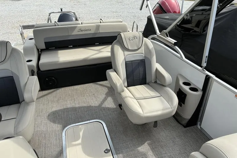 Slide: The Image of Luxurious interior of 2021 Barletta C22UC pontoon boat with plush seating. - 7