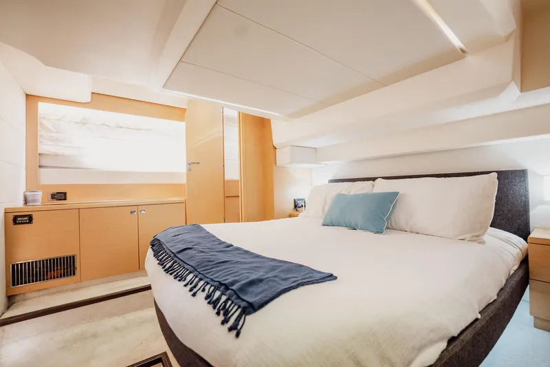 Slide: The Image of Luxurious bedroom interior of 2013 Prestige 500S yacht with modern design and cozy bedding. - 20
