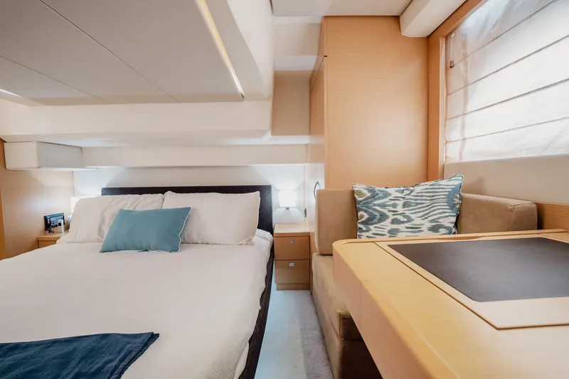 Slide: The Image of Luxurious interior of 2013 Prestige 500S yacht with cozy bed and elegant decor. - 23