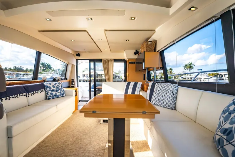 Slide: The Image of Luxurious interior of 2013 Prestige 500S yacht with elegant seating and panoramic windows. - 39