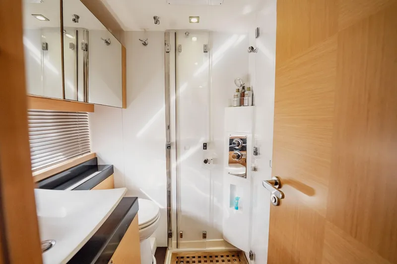Slide: The Image of Luxurious bathroom interior of 2013 Prestige 500S yacht, featuring modern fixtures and elegant design. - 58