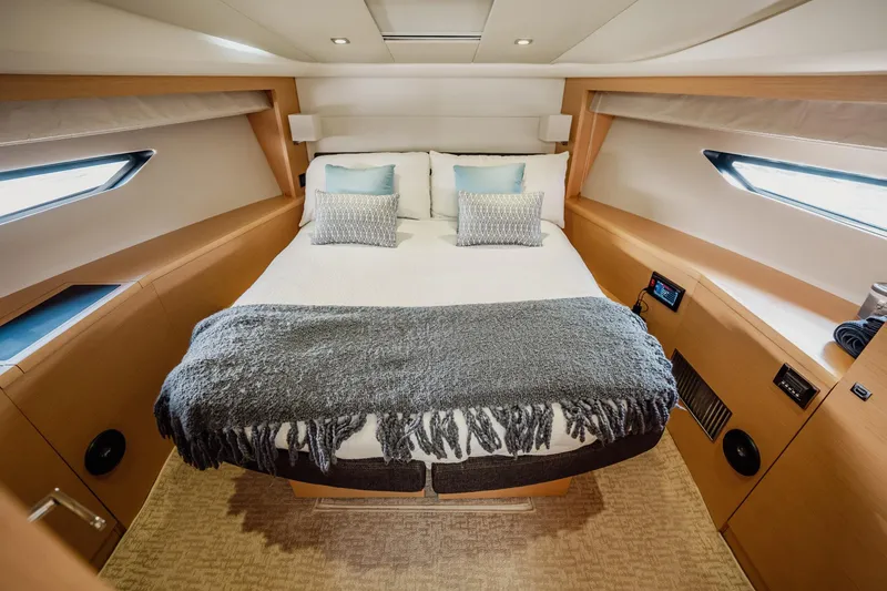 Slide: The Image of Luxurious cabin interior of 2013 Prestige 500S yacht with cozy bed and modern design. - 59