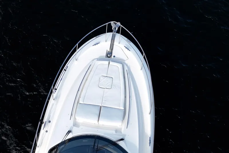 Slide: The Image of Aerial view of 2013 Prestige 500S yacht's bow on dark water. - 68