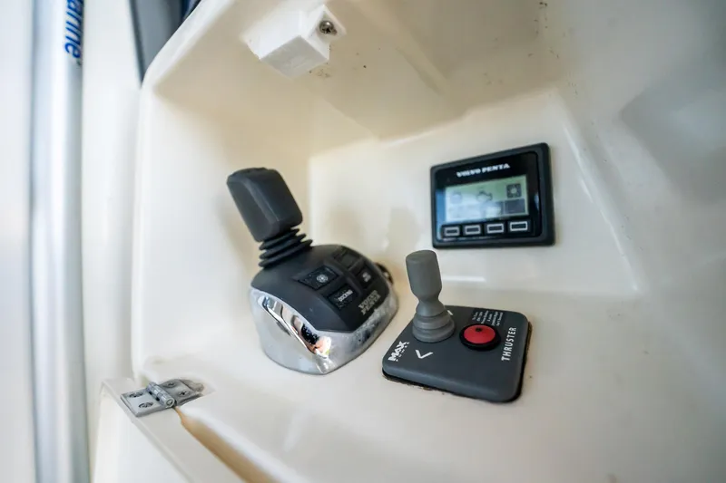 Slide: The Image of Control panel of a 2013 Prestige 500S yacht with joystick and display. - 75