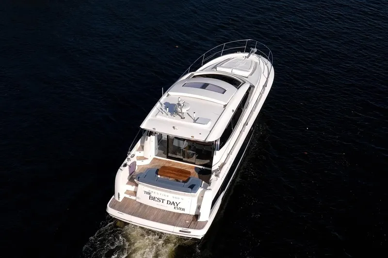 Slide: The Image of Aerial view of 2013 Prestige 500S yacht cruising on dark water. - 81