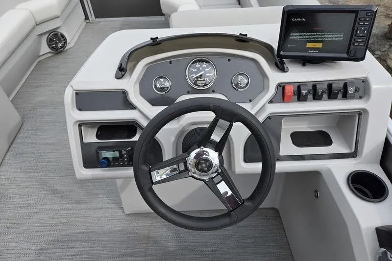 Slide: The Image of Steering console of 2025 Godfrey Xperience 2286 SBX Sport Tube with Garmin display. - 13
