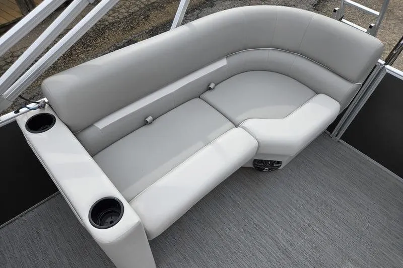 Slide: The Image of Luxurious seating on 2025 Godfrey Xperience 2286 SBX Sport Tube boat, featuring cup holders. - 15